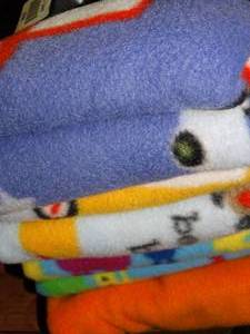 lot 23396 image: Lot of Fleece Fabric and Boas