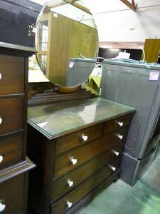 lot 23481 image: 5 Drawer Dark Wood Dresser with White Knobs and Unique Round Vanity Mirror