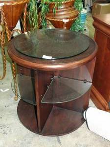 lot 23539 image: Glass Topped 24 Diameter Round Wood Table w Glass shelves