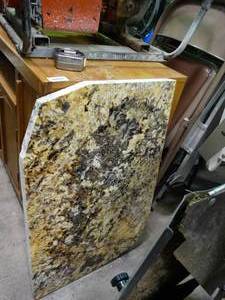 lot 23803 image: Piece of Granite Countertop