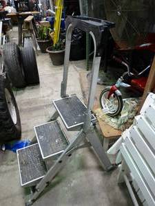 lot 23806 image: Rolling Folding Metal Step Ladder