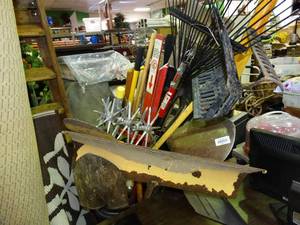 lot 23814 image: Large Trash Can  Full of Long Handled Tools