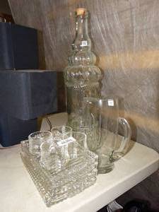 lot 23733 image: Tall Clear Glass Bottle  Glasses and Platters