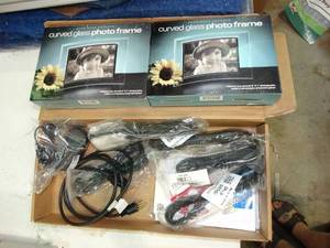 lot 23760 image: Curved Glass Photo Frames and Power Cords