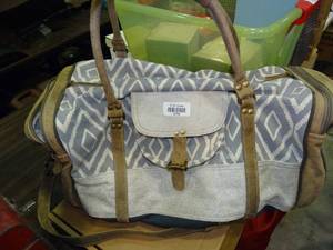lot 23783 image: Cloth Myra Duffle Bag with Hello Gorgeous Makeup Bag