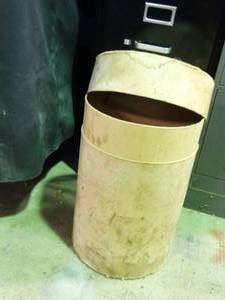 lot 23895 image: Small Paper Drum with Masonry Tools