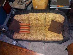 lot 23948 image: 3-Piece Black Wicker Patio Set with Throw Pillows