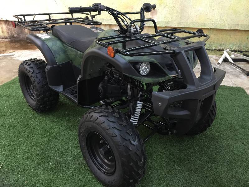 lot 400 image: NEVER DRIVEN  150cc ATV Four Wheeler with 23 Tires, Automatic with Reverse