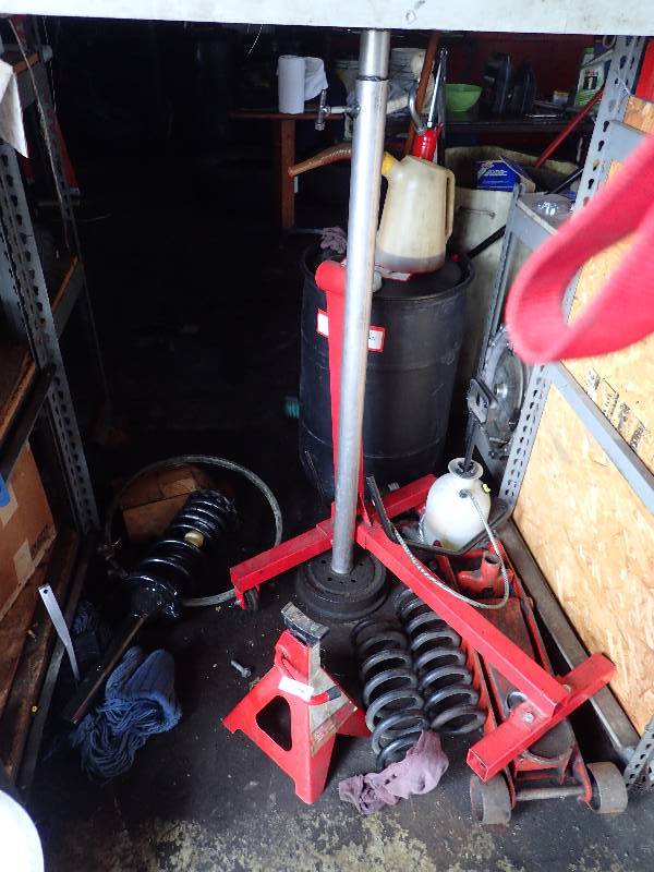 lot 141 image: Lot of Springs Jack Stand Engine And More