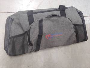 lot 1988 image: Grey Duffle Bag
