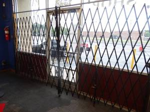 lot 21605 image: Folding Security Gate