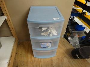 lot 21666 image: 3-Drawer Plastic Organizer with Assorted Gaming Controllers