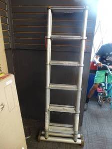 lot 21676 image: 5-12ft Telescoping Step Ladder