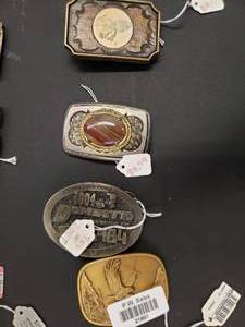 lot 21891 image: 4 collectable belt buckles