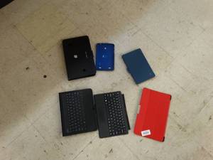 lot 21779 image: Various tablet cases