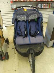 lot 24520 image: Baby Trend Double Jogging Stroller