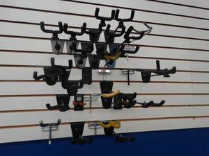 lot 24556 image: Lot of Slat Wall Guitar Hangers