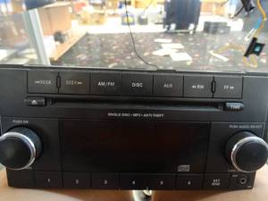 lot 24775 image: Stereo for 12-16 Chrysler Town and Country Dodge Caravan