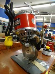 lot 24833 image: Eastman Cardinal Round Knife Cutting Machine