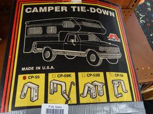 lot 24857 image: Camper tie down brackets.
