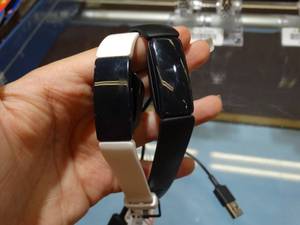 lot 24898 image: Lot of 2 Smart Bracelets with Chargers