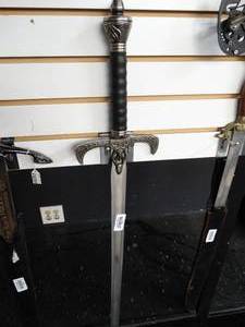 lot 37814 image: Sword with Black and Silver Handle