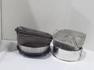 lot 1038 image: Bakeware. Cake Pans, Bread Pans and a Strainer
