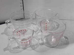 lot 1064 image: 2. PYREX Measuring Bowls, 1 ANCHOR HOCKING and a Reg. Bowl