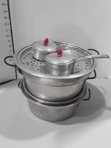 lot 1065 image: 5 Interchangeable Aluminum Pans. 2 are for doing Poached Eggs