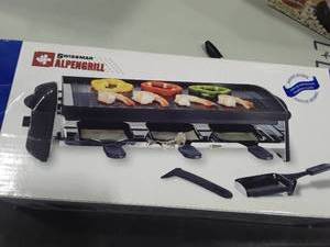 lot 1100 image: SWISSMAR Alpengrill. Appears to be NIB