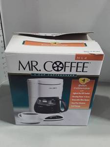 lot 1103 image: MR. COFFEE 4Cup Coffee Maker. Appears to be NIB.