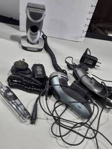 lot 1158 image: 3 Electric Razors and a Small Trimmer