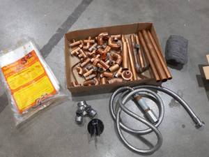 lot 1188 image: Copper Plumbing Couplings and Pipes with Various Plumbing Items