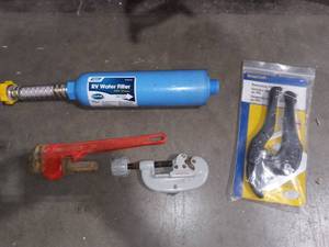 lot 1193 image: Vintage Sears 10 in Pipe Wrench with Rigid Pipe Cutter and More
