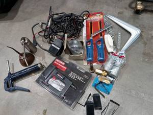 lot 1557 image: Craftsman Electric Stapler New and Craftsman Vintage Oil Can with Various Garage Items