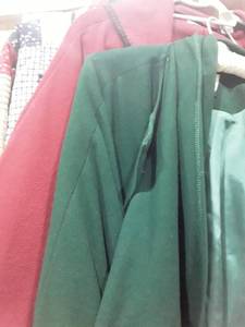 lot 1616 image: Womens Capes and a Quilted Jacket. Green Cape was made in Ireland