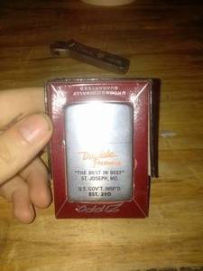 lot 947 image: Dugdale packing co zippo lighter