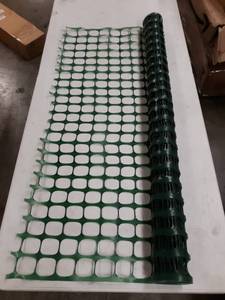 lot 65737 image: Green Plastic Mesh Fencing. 4ft Tall. 2 x 1.75 Openings.