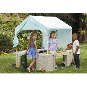 lot 65837 image: Little Tikes Backyard Bungalow Role Play Playhouse with pretend kitchen, garden, and canopy