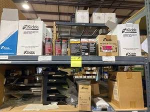 lot 29120 image: Rack of bulbs, fire alarms and office supplies