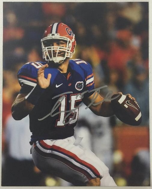 lot 1031 image: Signed 8x10 Photo Tim Tebow Quarterback of Florida Gators Heisman Trophy Winner