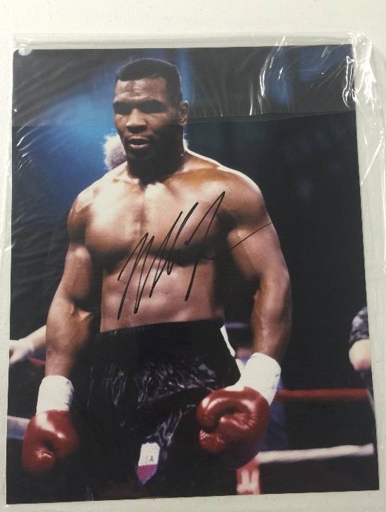 lot 1044 image: Signed 11x14 Photograph Mike Tyson Heavyweight Champ Baddest Man on the Planet