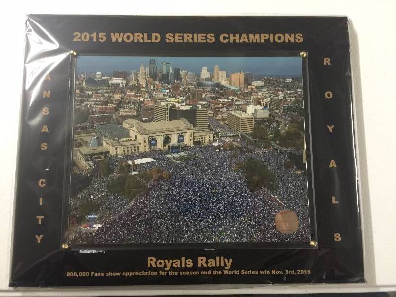 lot 1047 image: MINT 8x10 Photograph in 11x14 Plaque of the 2015 World Series Championship Kansas City Royals Parade (Royals Rally)