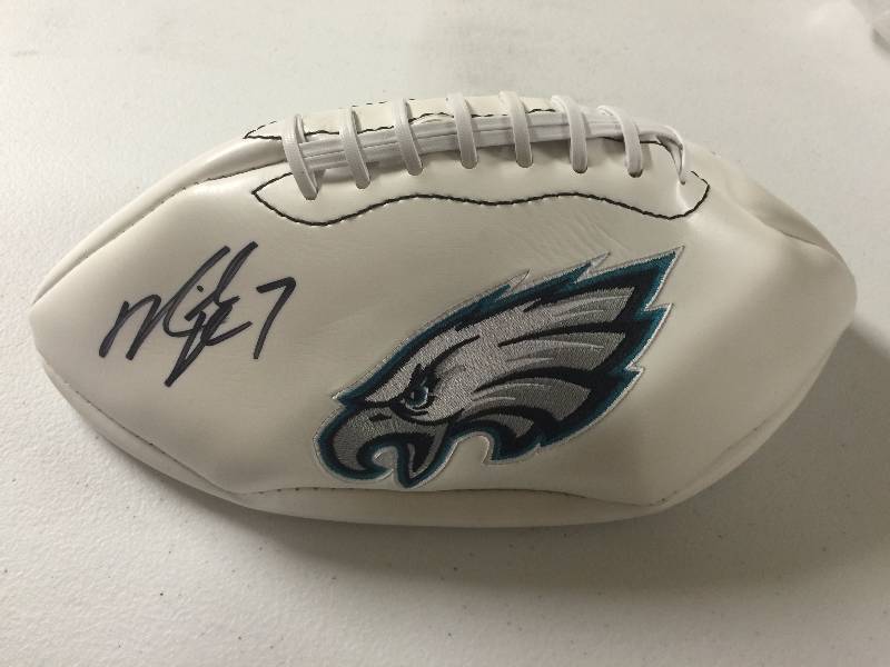 lot 1075 image: White Panel Philadelphia Eagles Embroidered Football Signed by Michael Vick