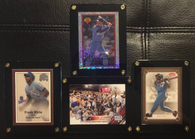 lot 1215 image: Four Kansas City Royals Baseball Cards 4 Screw Acrylic Holders Brett, Bo Jackson, Frank White, Salvy Champs