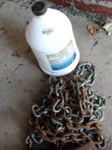 lot 38263 image: Jug of propylene glycol & chain