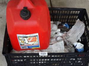 lot 38135 image: Plastic Gas Can and Misc. Plumbing Supplies