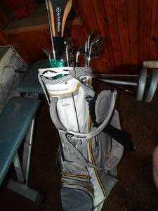 lot 38157 image: Grey Sun Mountain Golf Bag with Assorted Clubs