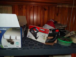 lot 38168 image: Contents of Top Shelf-- Work Gloves, Spiral Saw, Flag, Etc