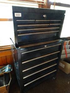 lot 38180 image: Large Black Metal Toolbox on Wheels with Assorted Contents
